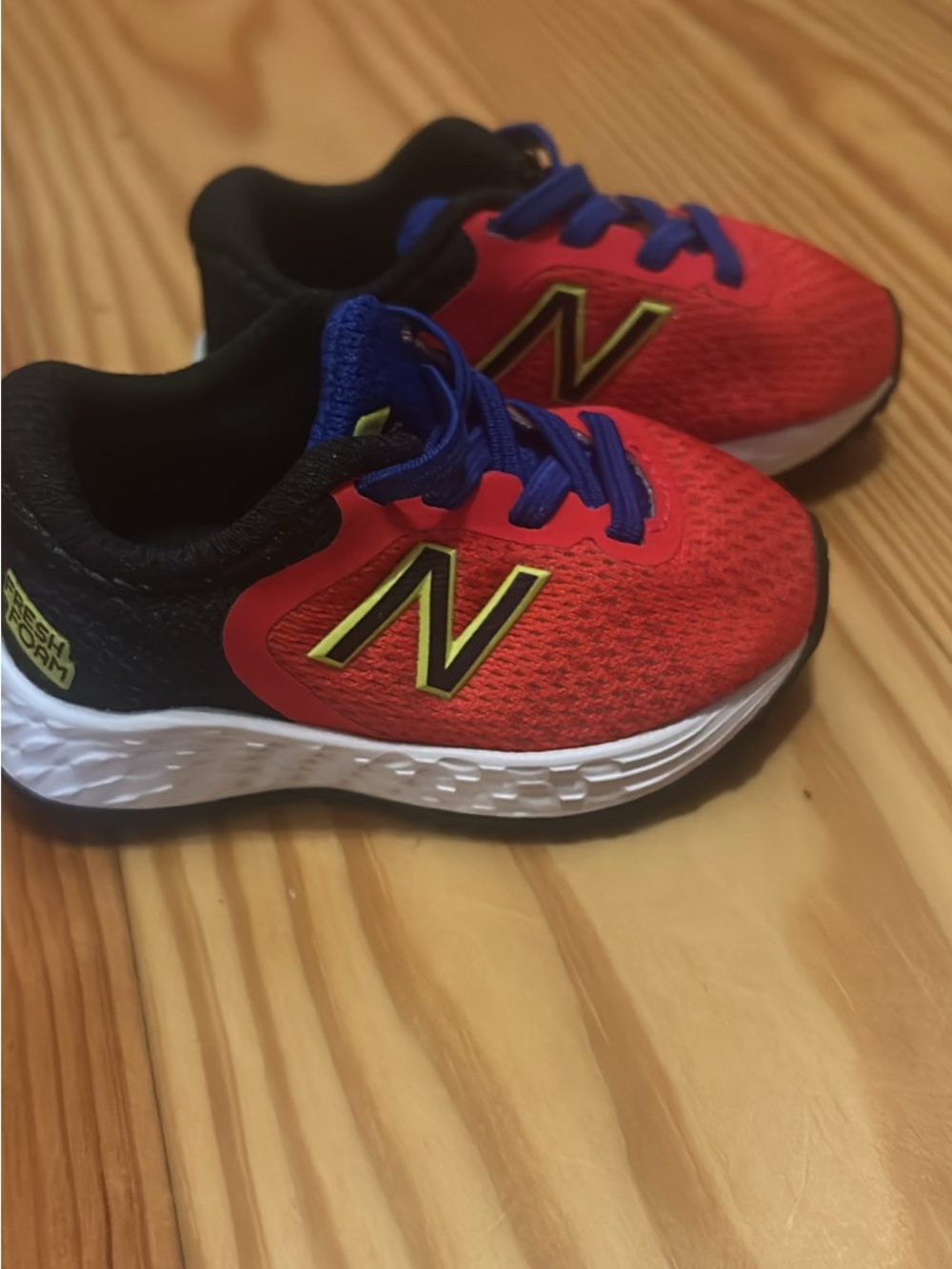 New Balance Kids Red and Blue Athletic Sneakers with Neon Logo